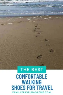 Footprints in wet sand on beach