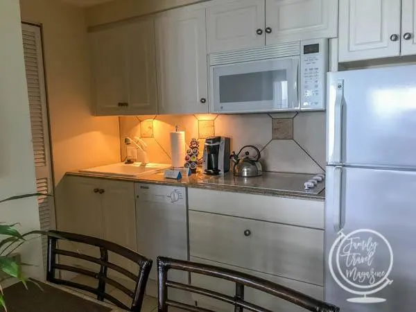A kitchen in a hotel room 
