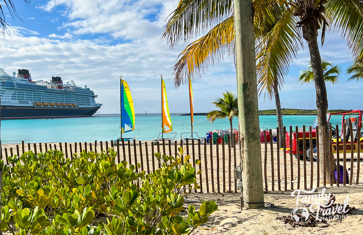 Disney cruise ship docked at Castaway Cay (Disney Cruise Line packing list)