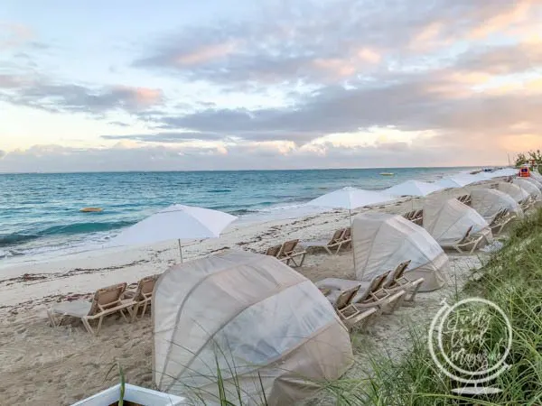 The beach with umbrellas and chairs 