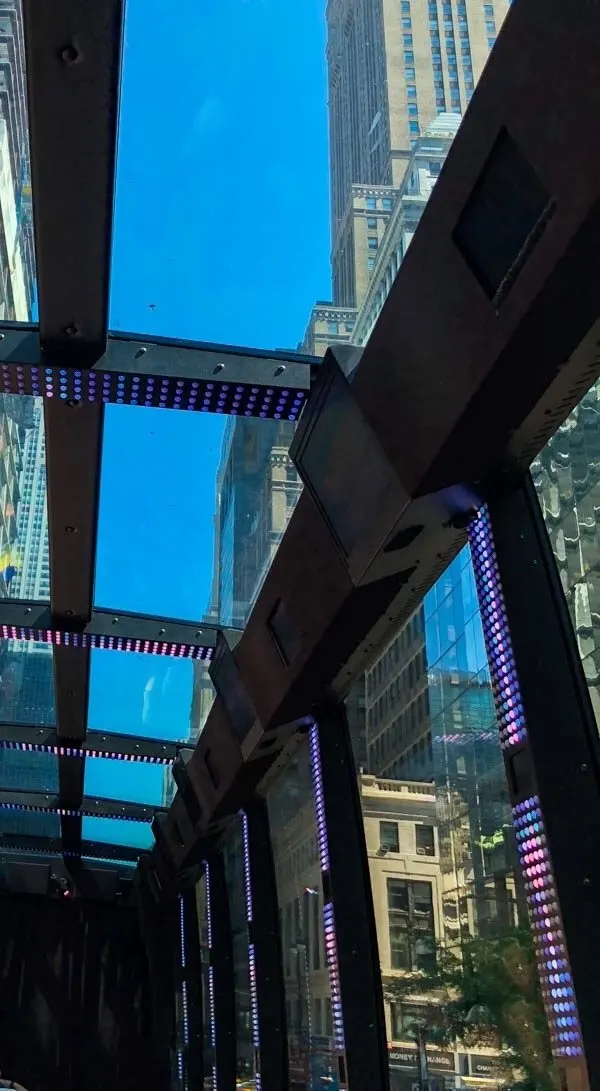 Floor to ceiling windows in the Ride NYC bus