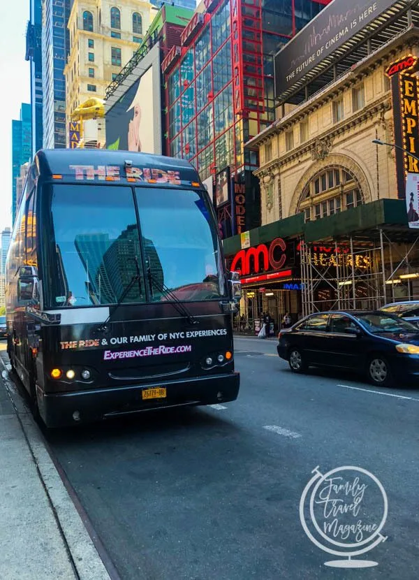 The Ride bus parked outside an AMC theater in NYC