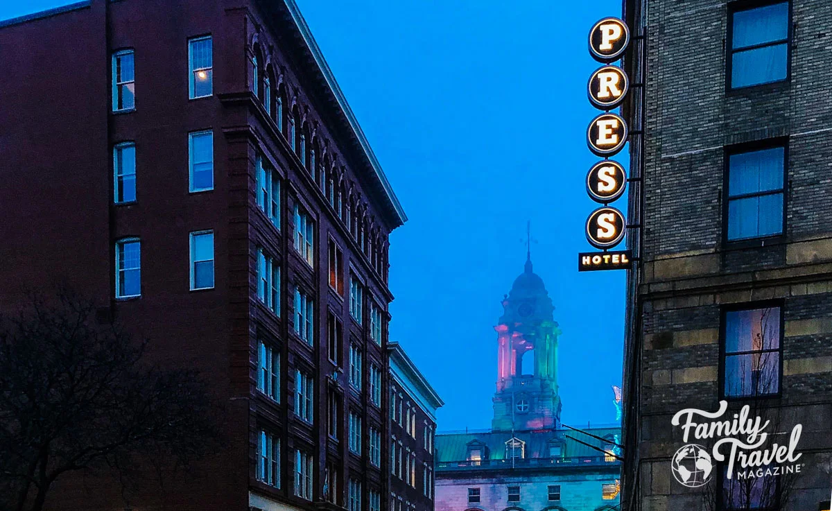 The Press Hotel in the rain with City Hall in the background