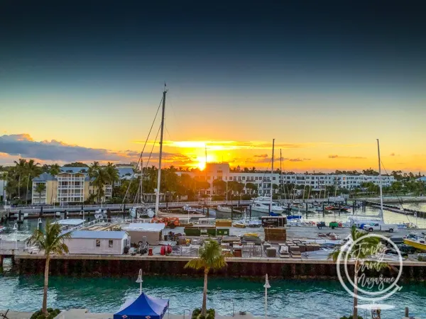 Key West sunrise with buildings at the port