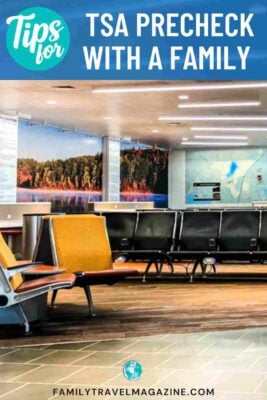 an empty waiting area in an airport with chairs