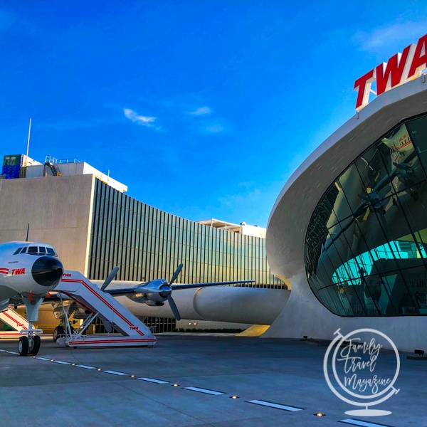 TWA Hotel exterior with Connie aircraft cocktail bar on the side
