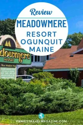 Exterior of Meadowmere with sign and greenery in front of building