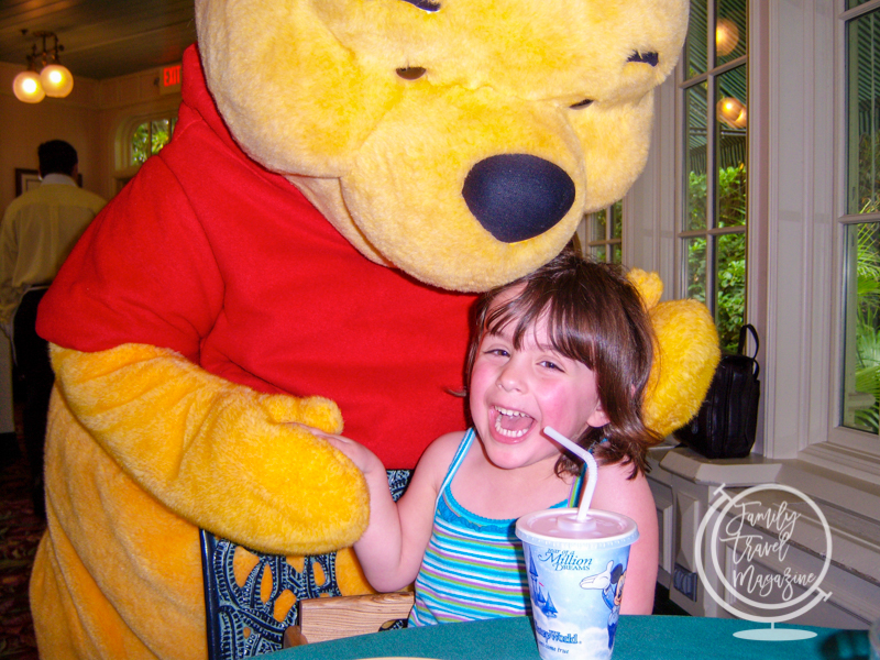 The Crystal Palace at the Magic Kingdom - Winnie the Pooh with girl 