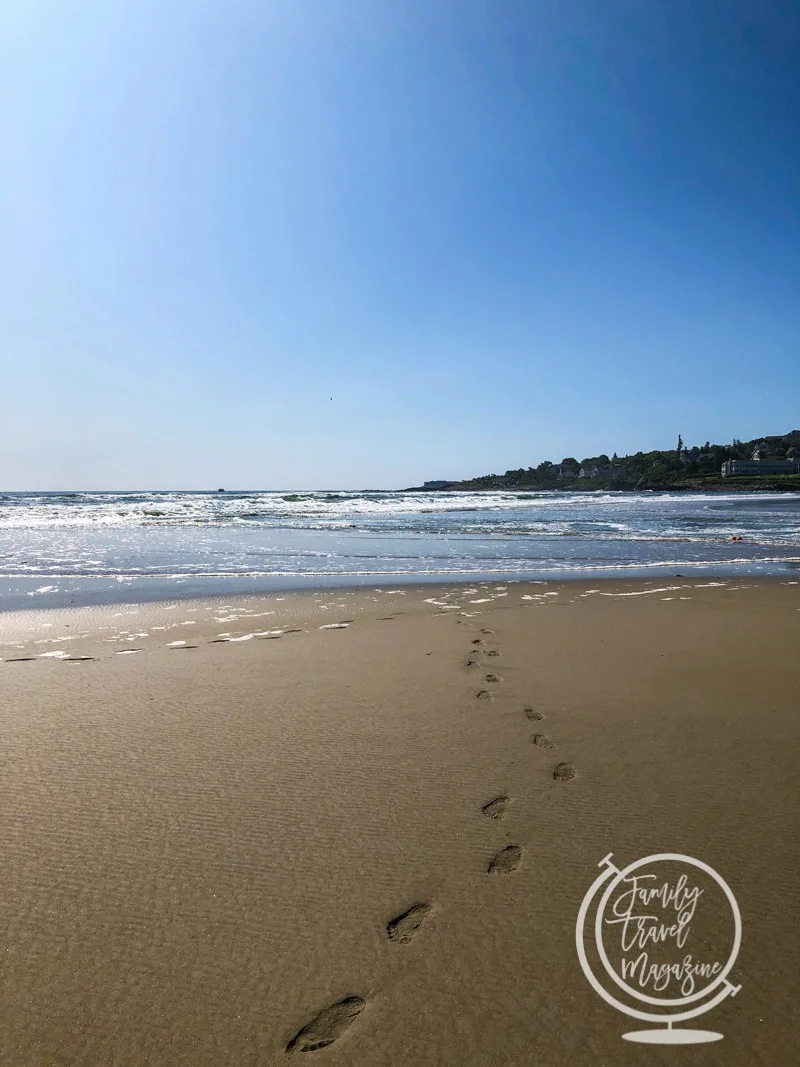 Footprints on empty beach