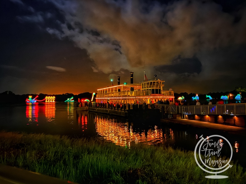Disney boat lit up at night