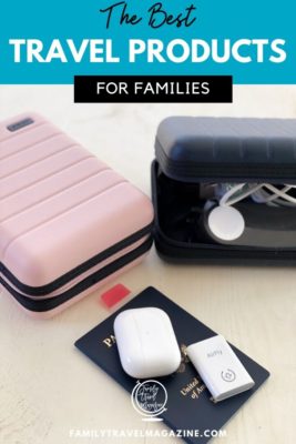 Assortment of travel items including mini suitcases, airpods, passport, Airfly device