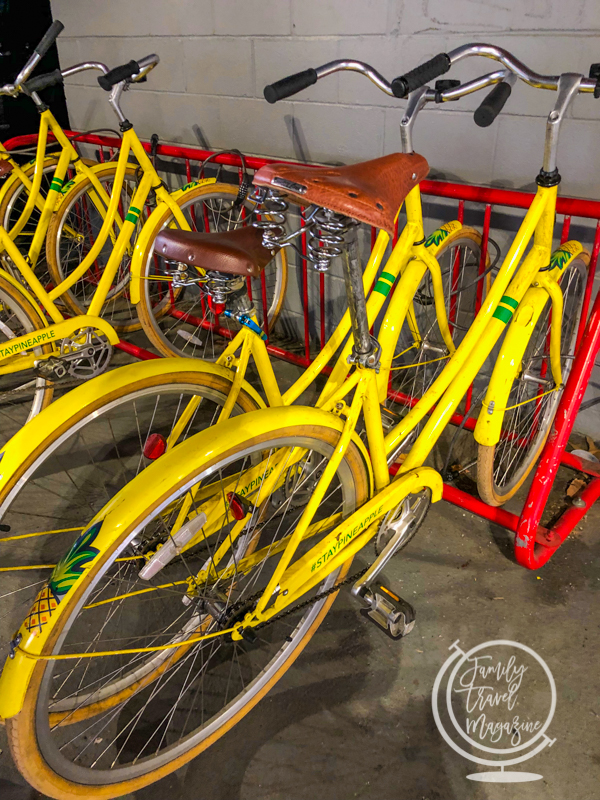 Yellow rental bikes on bike rack