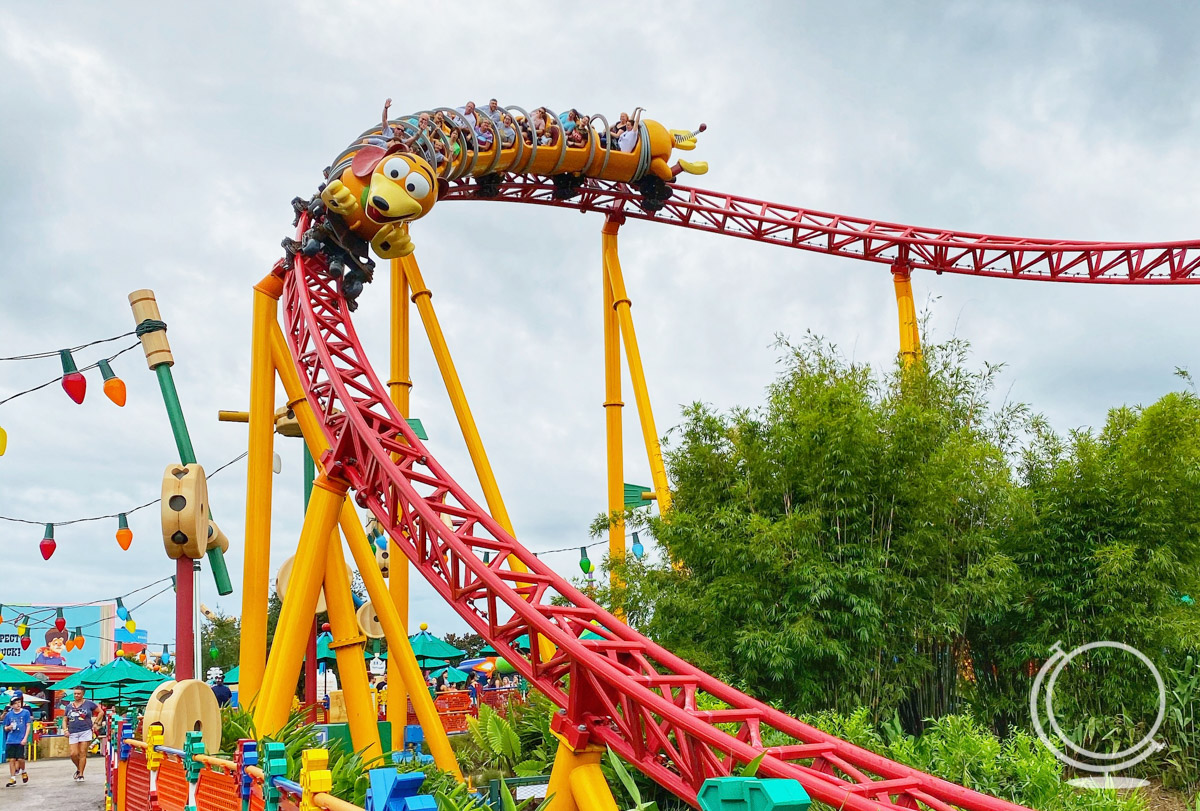 Slinky Dog dash ride vehicle headed down a drop - one of the best roller coasters at disney world. 