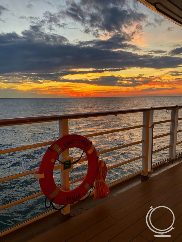 Sunset over the balcony on the Disney Dream