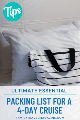 White and black striped tote on a white bed