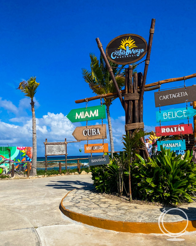 Costa Maya cruise port sign with cities listed 