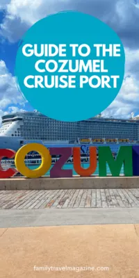 Colorful letters spelling Cozumel with the Odyssey of the Seas in the background. 