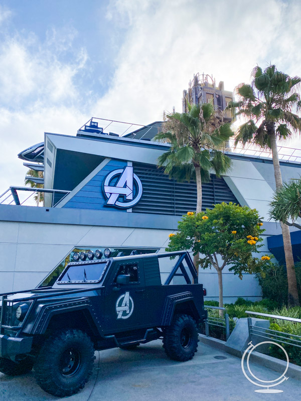 Avengers jeep in front of Avengers Campus building 