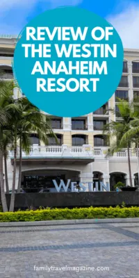 Exterior of Westin Anaheim with large Westin sign and palm trees