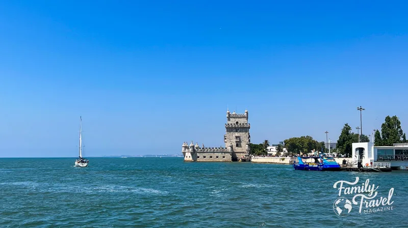 Belem Tower and sailboat from the water