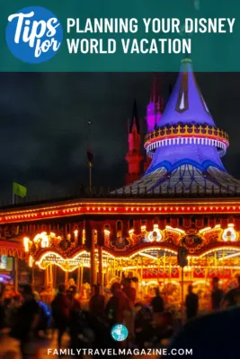 Disney carousel lit up at night
