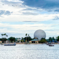 Epcot Spaceship Earth from afar with World Showcase Lagoon in the foreground
