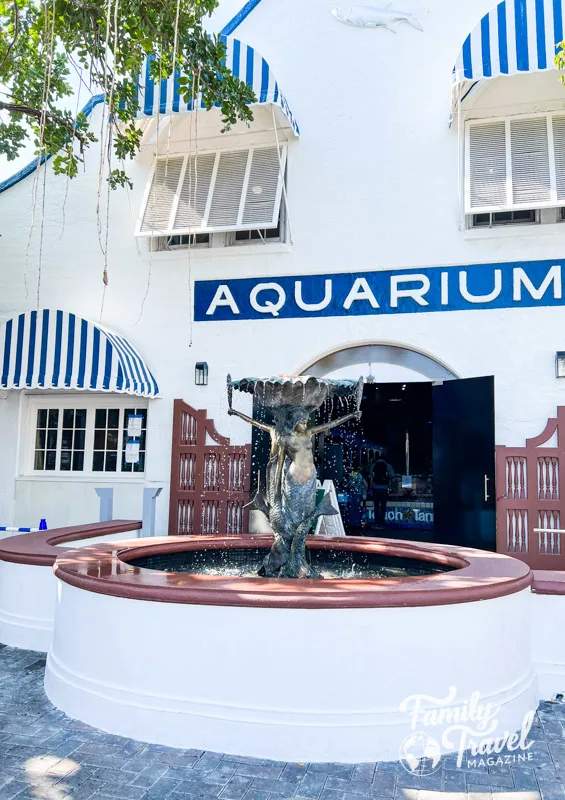 Entrance to Key West Aquarium with fountain in front