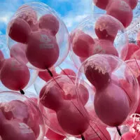 Pink Mickey balloons in the sky - 