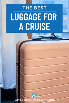 Pink luggage in front of a cruise verandah door