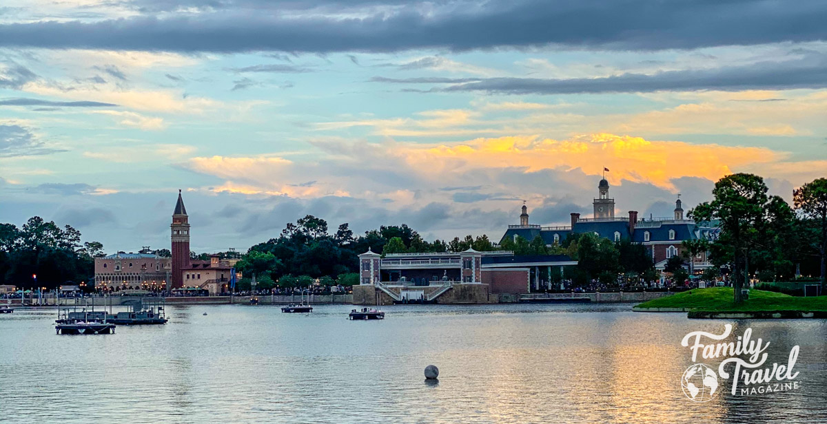 The World Showcase at sunset with view of Italy pavilion and American Adventure from the waterfront (Planning a trip to Disney World on a Budget)