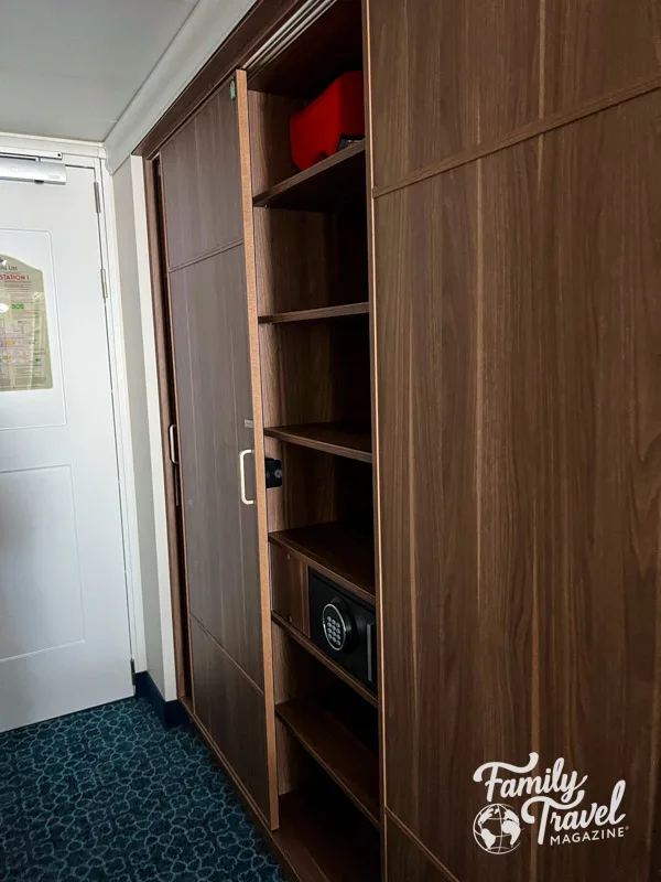 Closet in a Disney Wish stateroom showing open shelves