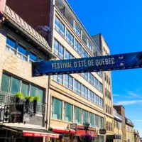 Festival d'ete de Quebec sign over a Quebec City street