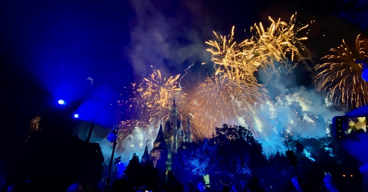 fireworks over the castle at the Magic Kingdom during Halloween, one of the best times to visit Walt Disney World
