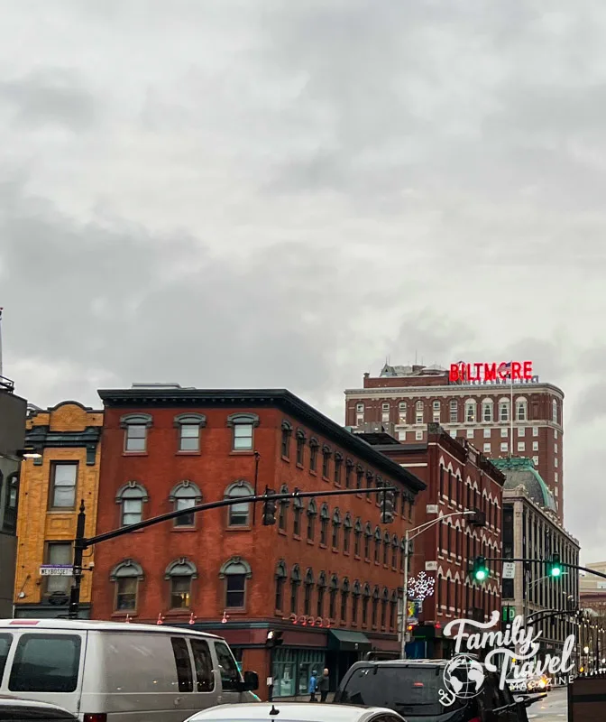 The Biltmore sign on top of the Graduate Hotel in Providence along a busy street