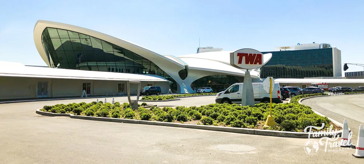 Exterior of the TWA hotel with sign