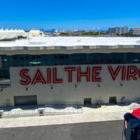 Cruise port building - terminal V -Virgin Voyages with Sail the Virgin Way written on it.
