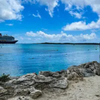 Disney Wish docked at Castaway Cay, a fun component of a Disney Land and Sea vacation