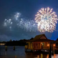 Fireworks over Polynesian overwater bungalows