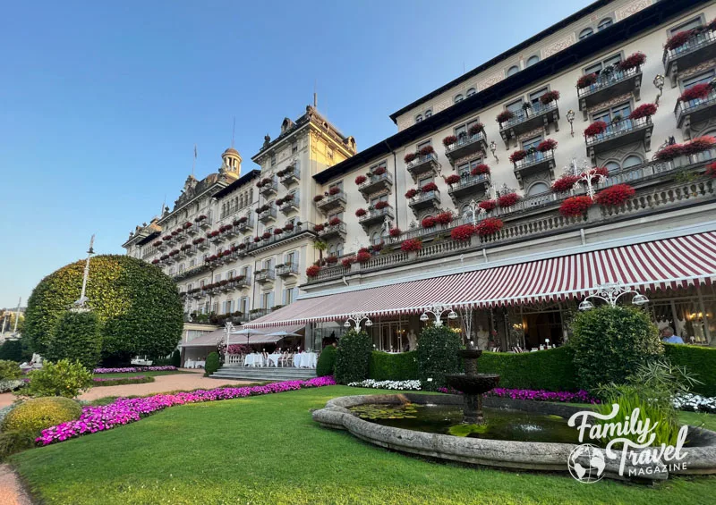 Large historic hotel with landscaped entrance