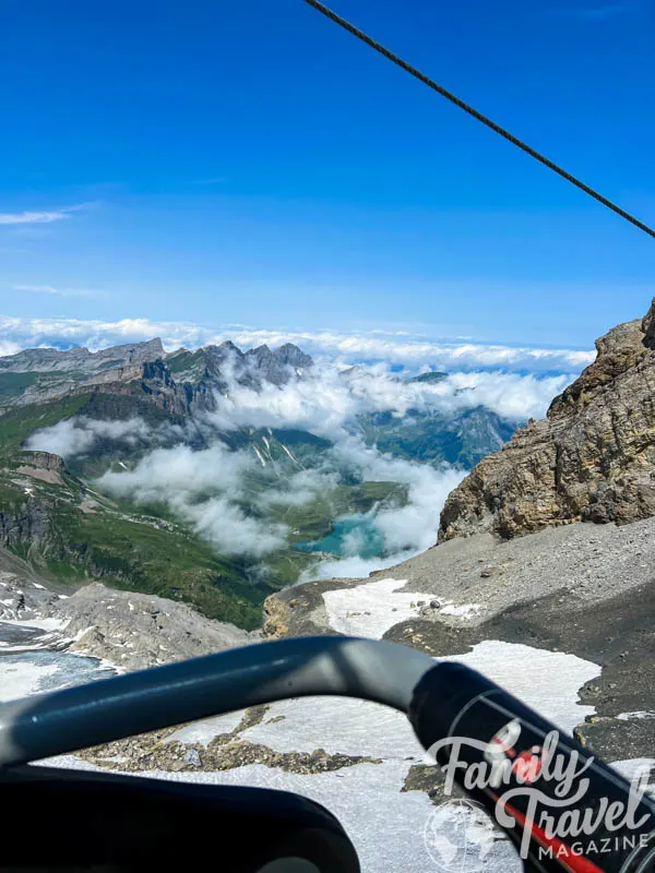 Mountain, cloud, and lake view from Ice Flyer chair lift 