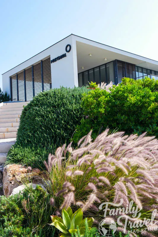 Main building at Martinhal with plants in the foreground