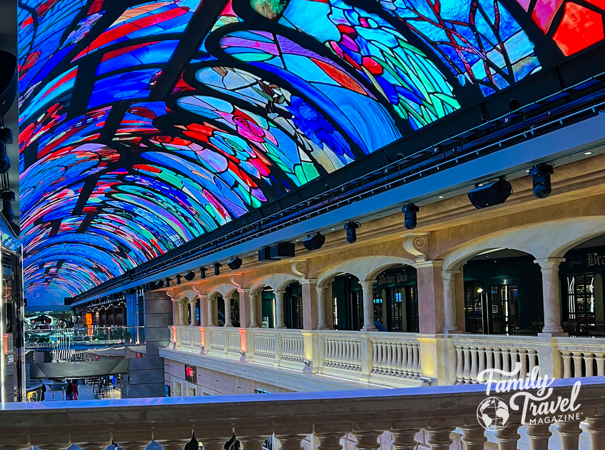 Galleria Meraviglia promenade with LED domed ceiling showing stained glass