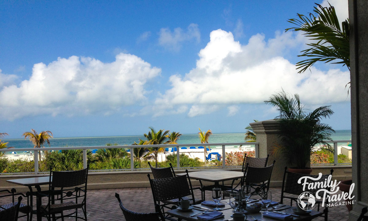 View of beach from waterfront restaurant at Marco Beach Ocean Resort