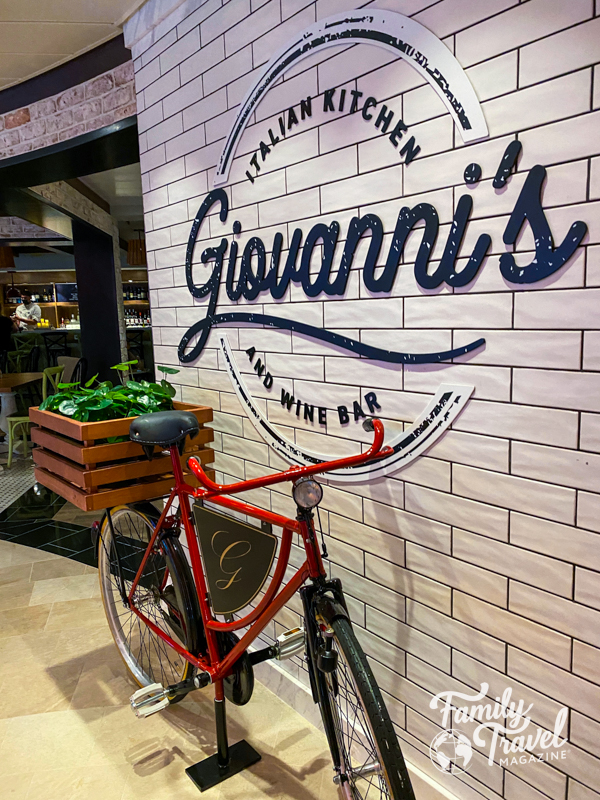 Giovanni's exterior with sign and bike