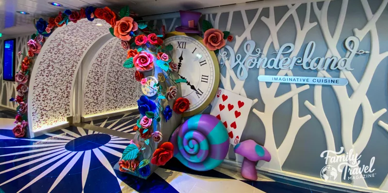 Wonderland exterior with clocks and colorful flowers