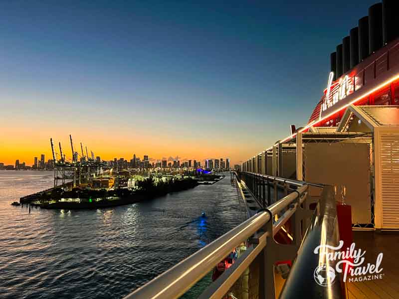 Port Miami at sunset on the dock of a Virgin Voyages ship