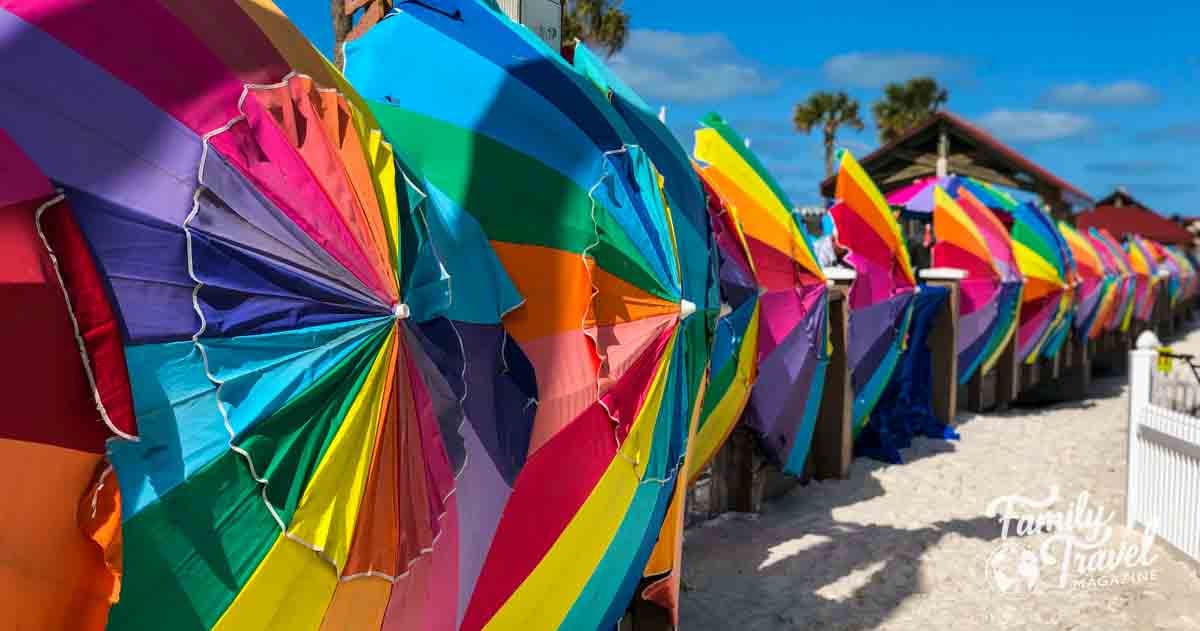 Colorful umbrellas on their sides on the beach