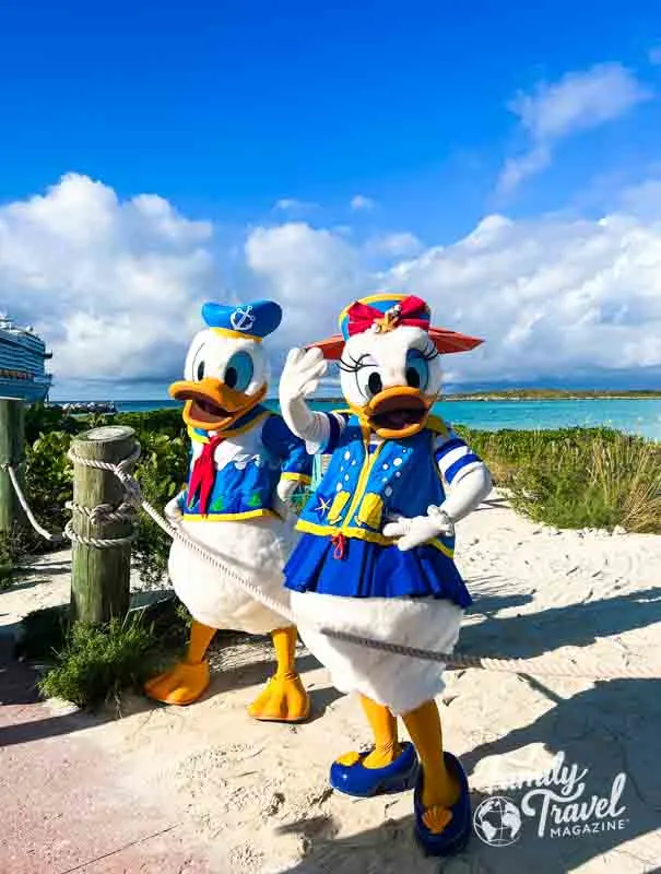 Donald and Daisy posing on beach at Castaway Cay