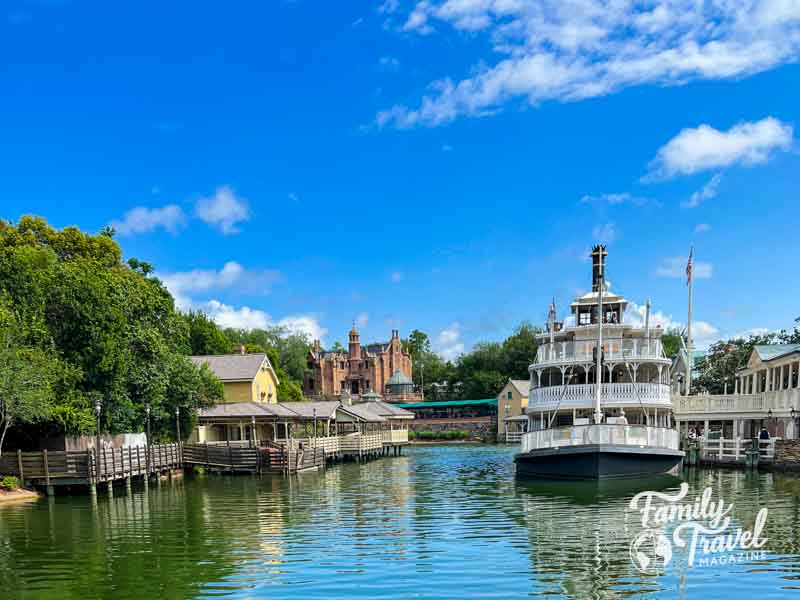 Riverboat, haunted mansion, and pier at the Magic Kingdom