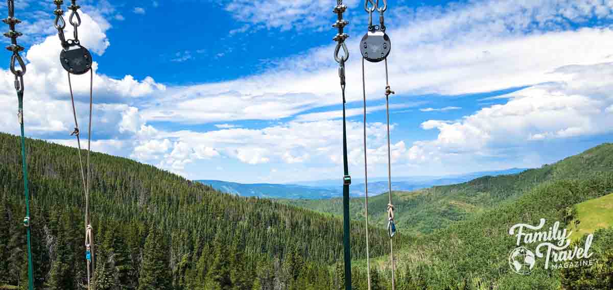 Ropes course lines in front of the mountains and blue sky at Vail